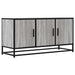 Dulap TV gri sonoma, 100x35x50 cm lemn prelucrat și metal - WALTI WALTI