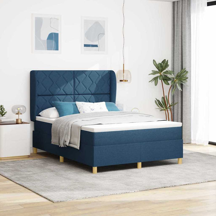 Pat cu arcuri cu headboard albastru 190 x 140 cm țesătură - WALTI WALTI