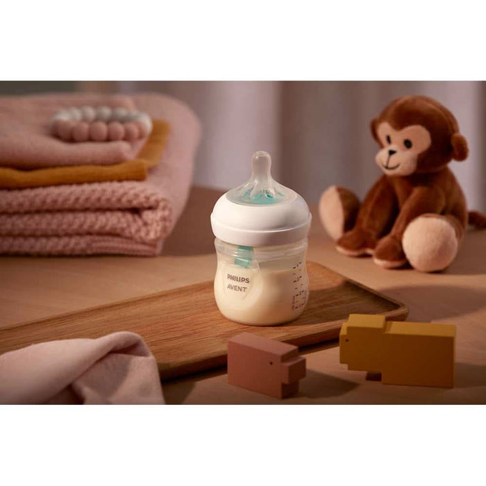 Set 2 biberoane cu dispozitiv anticolici PHILIPS AVENT Natural Response AirFree SCY670/02, flux nou-nascut, 0 luni+, 125ml, alb-verde WALTI