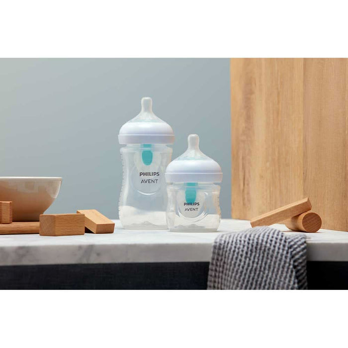 Set 2 biberoane cu dispozitiv anticolici PHILIPS AVENT Natural Response AirFree SCY670/02, flux nou-nascut, 0 luni+, 125ml, alb-verde WALTI